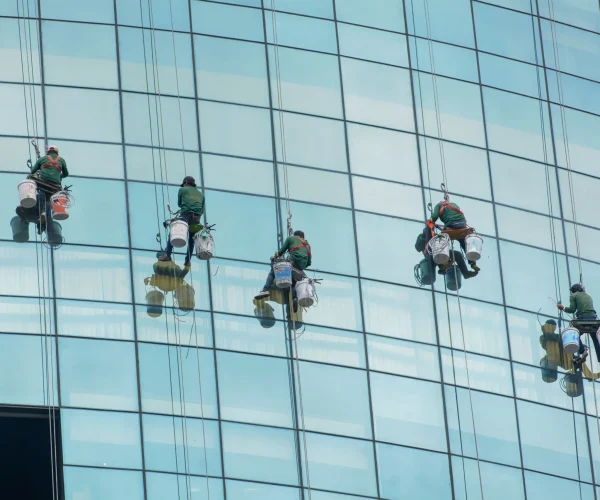 workers-hanging-down-while-cleaning-the-glass-wind-2026-01-07-06-38-44-utc (1) (1)